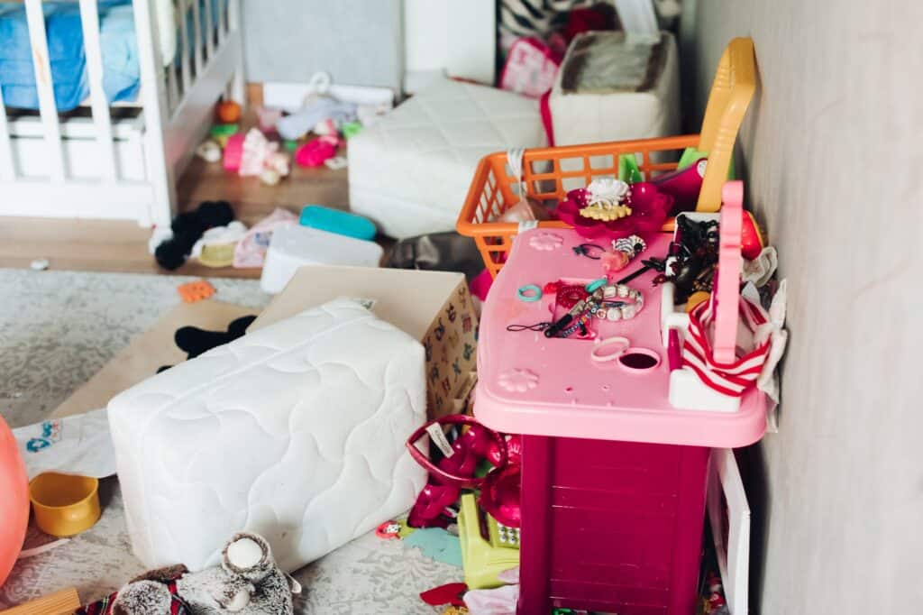 Cropped image of a child's room with scattered toys for decluttering