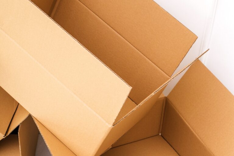 Empty carton after the relocation in the concept of 'What to Do with Packing Materials After Moving House to West London'.